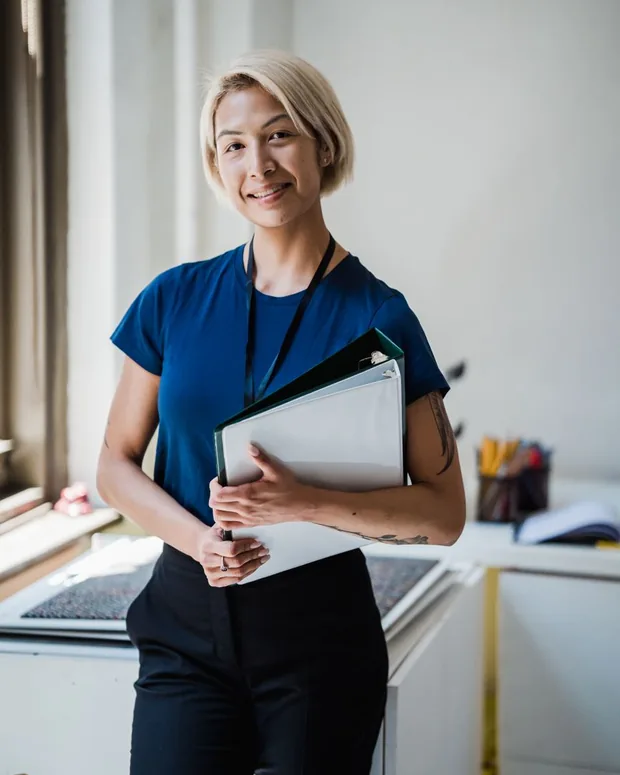 Equipe de empresa sorrindo com o plano de saúde empresarial e para MEI